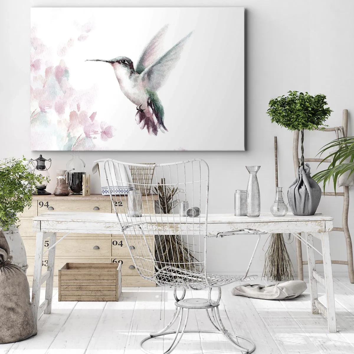 Bild auf Leinwand - Leinwandbild - Ein Kolibri in zarten Pastellfarben vor einem Hintergrund aus Blumen - 70x50cm - Im Flattern gehalten - Moderne Wanddekoration für Wohnzimmer und Schlafzimmer ARTTOR