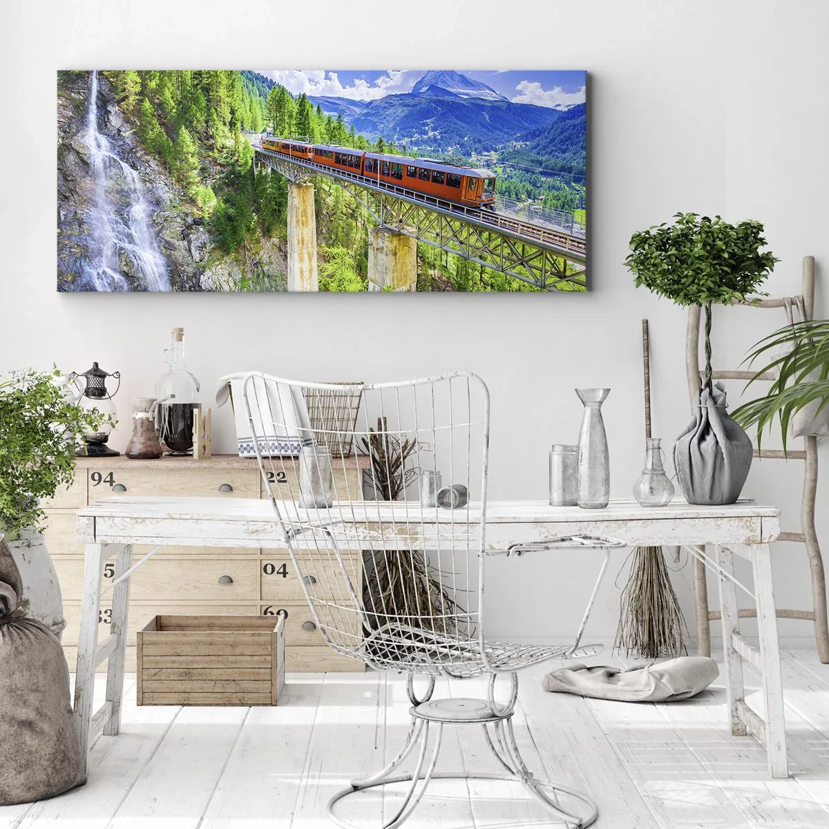 Bild auf Leinwand - Leinwandbild - Eine Achterbahn auf einer Brücke mit Blick auf einen Wasserfall und Berge - 120x50cm - Jetzt sind Alpen dran - Moderne Wanddekoration für Wohnzimmer und Schlafzimmer ARTTOR