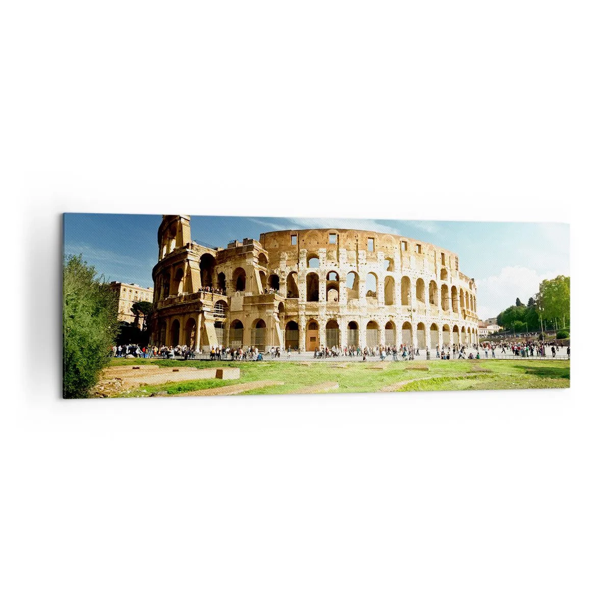 Bild auf Leinwand - Leinwandbild - Das Kolosseum in Rom, umgeben von Grün und blauem Himmel - 160x50cm - Wir können immer noch das Knallen der Waffe hören - Moderne Wanddekoration für Wohnzimmer und Schlafzimmer ARTTOR