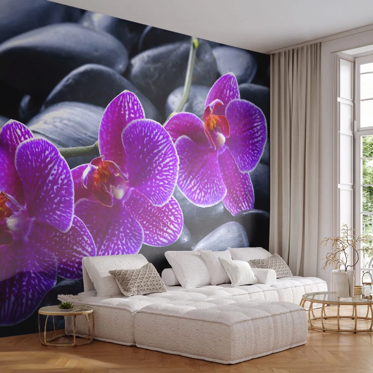 Fototapete Premium Sand - Lila Orchideen vor einem Hintergrund aus schwarzen Steinen - 100x70cm - Die Steine