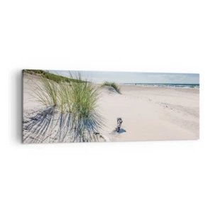 Bild auf Leinwand - Leinwandbild - Ein Ostseestrand mit Sand, Gras und einem ruhigen blauen Himmel - 140x50cm - Der schönste Strand? Ostsee-Strand - Moderne Wanddekoration für Wohnzimmer und Schlafzimmer ARTTOR