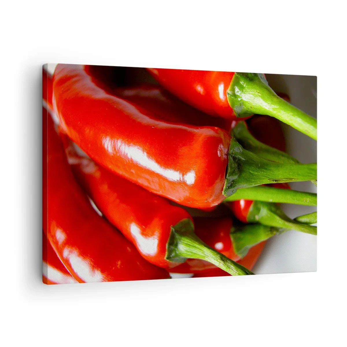 Bild auf Leinwand - Leinwandbild - Nahaufnahme von roten Chilischoten mit grünen Stielen - 70x50cm - Saftig, glänzend, glatt - Moderne Wanddekoration für Wohnzimmer und Schlafzimmer ARTTOR