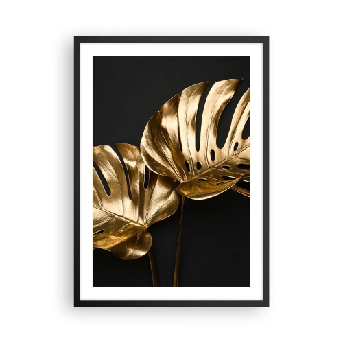 Poster in einem schwarzem Rahmen - Goldene Monstera-Blätter auf schwarzem Hintergrund, ein eleganter Farbkontrast - 50x70cm - Die Schätze der Natur - Moderne Wanddekoration für Wohnzimmer und Schlafzimmer ARTTOR