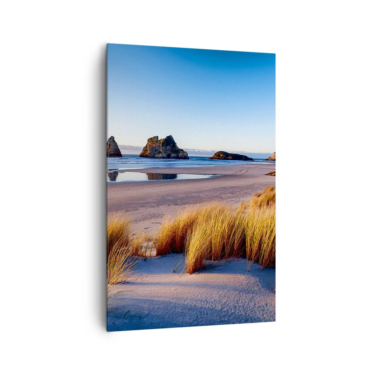 Bild auf Leinwand - Leinwandbild - Ein malerischer Strand mit Blick auf die Felsen und das Meer bei Sonnenuntergang - 80x120cm - Für Friedenssuchende - Moderne Wanddekoration für Wohnzimmer und Schlafzimmer ARTTOR