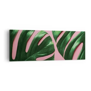 Bild auf Leinwand - Leinwandbild - Grüne Monstera-Blätter auf rosa Hintergrund - 140x50cm - Rendezvous im Grünen - Moderne Wanddekoration für Wohnzimmer und Schlafzimmer ARTTOR
