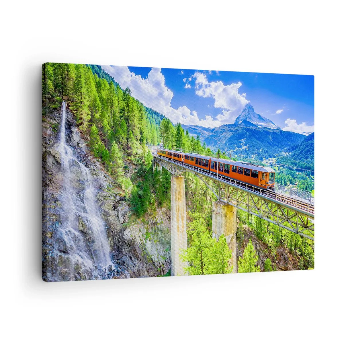 Bild auf Leinwand - Leinwandbild - Eine Achterbahn auf einer Brücke mit Blick auf einen Wasserfall und Berge - 70x50cm - Jetzt sind Alpen dran - Moderne Wanddekoration für Wohnzimmer und Schlafzimmer ARTTOR
