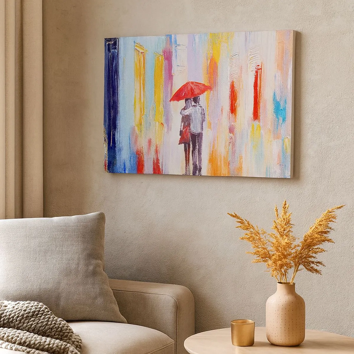 Bild auf Leinwand - Leinwandbild - Ein Paar unter einem roten Regenschirm mit bunten Gebäuden im Hintergrund. - 70x50cm - Lass es weiter regnen - Moderne Wanddekoration für Wohnzimmer und Schlafzimmer ARTTOR