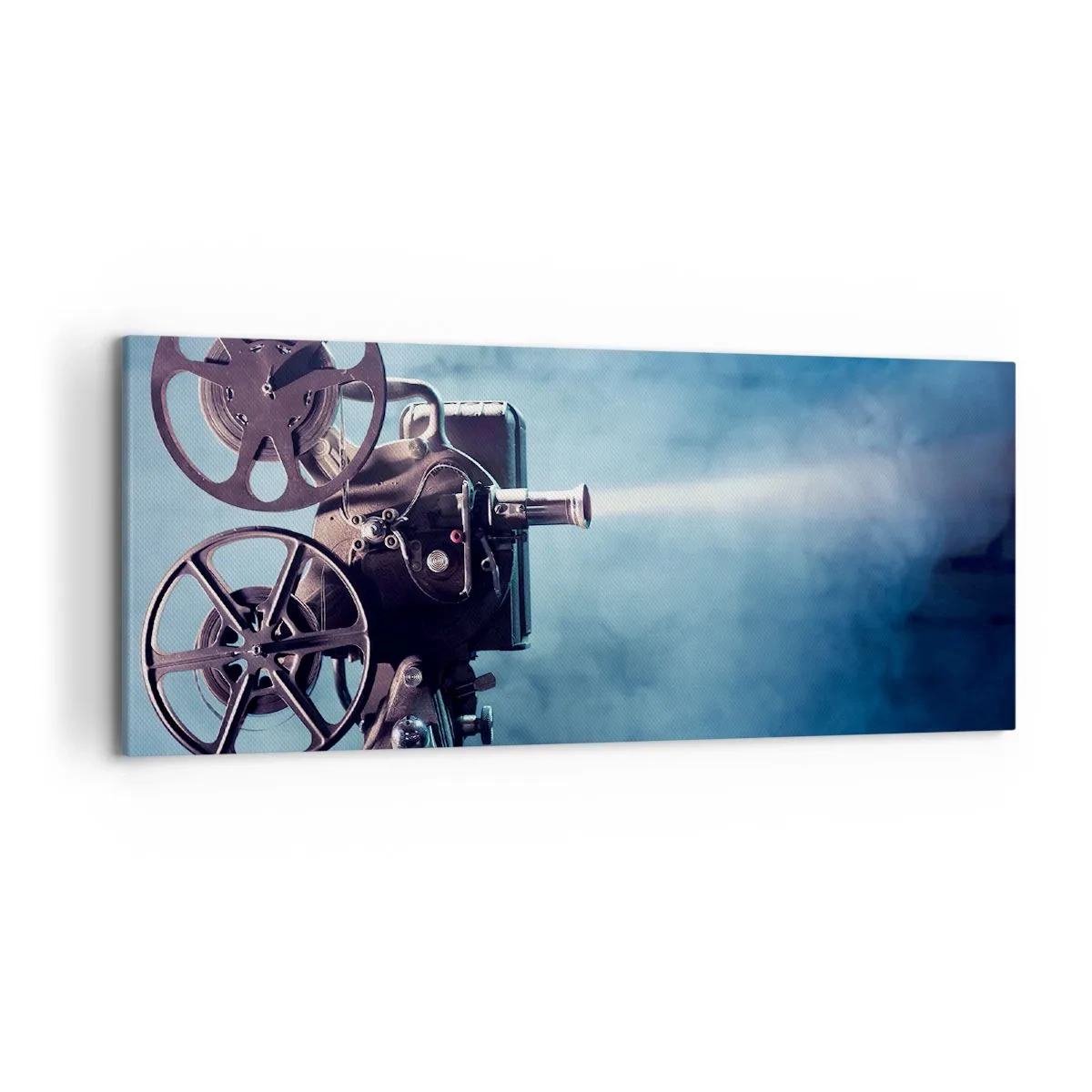 Bild auf Leinwand - Leinwandbild - Ein alter Filmprojektor wirft Licht vor einen blauen Hintergrund - 120x50cm - Im alten Kino - Moderne Wanddekoration für Wohnzimmer und Schlafzimmer ARTTOR