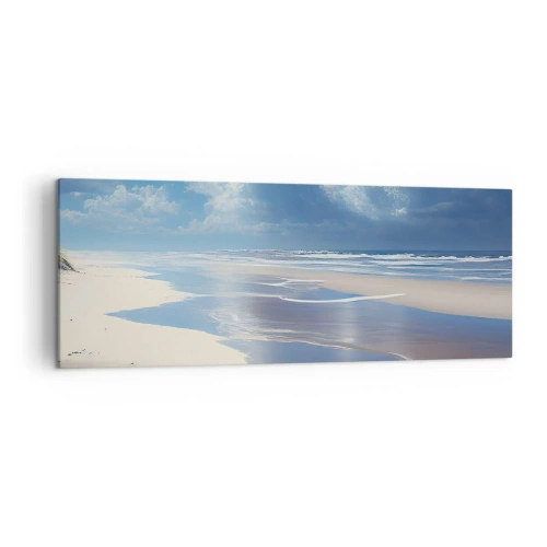 Bild auf Leinwand - Leinwandbild - Ein Sandstrand mit Wellen unter blauem Himmel - 140x50cm - Paradiesischer Urlaub - Moderne Wanddekoration für Wohnzimmer und Schlafzimmer ARTTOR