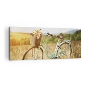 Bild auf Leinwand - Leinwandbild - Ein Retro-Fahrrad mit einem Korb voller Blumen vor einem Wiesenhintergrund. - 120x50cm - Ich bleibe eine Weile hier - Moderne Wanddekoration für Wohnzimmer und Schlafzimmer ARTTOR
