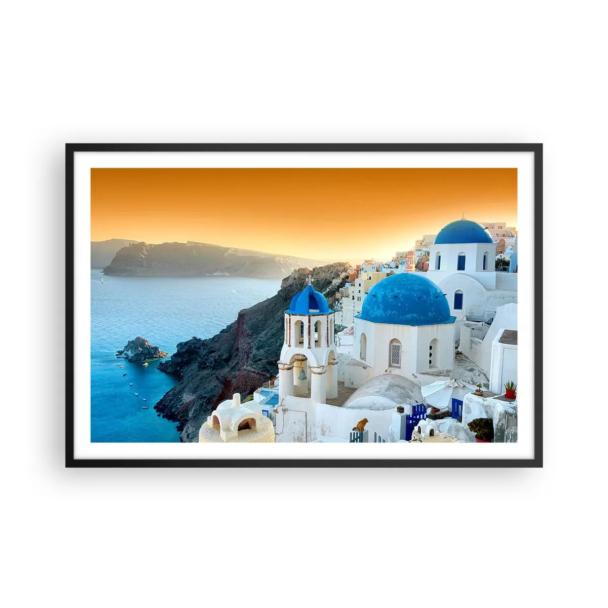 Poster in einem schwarzem Rahmen - Santorini - an die Felsen gekuschelt - 91x61 cm