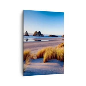 Bild auf Leinwand - Leinwandbild - Ein malerischer Strand mit Blick auf die Felsen und das Meer bei Sonnenuntergang - 70x100cm - Für Friedenssuchende - Moderne Wanddekoration für Wohnzimmer und Schlafzimmer ARTTOR