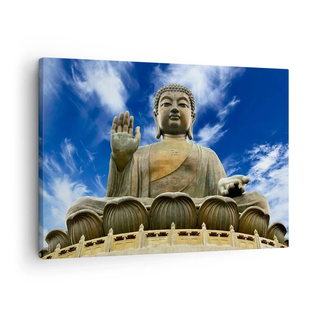 Bild auf Leinwand - Leinwandbild - Eine monumentale Buddha-Statue vor einem blauen Himmel mit Wolken - 70x50cm - Leben ohne Angst - Moderne Wanddekoration für Wohnzimmer und Schlafzimmer ARTTOR