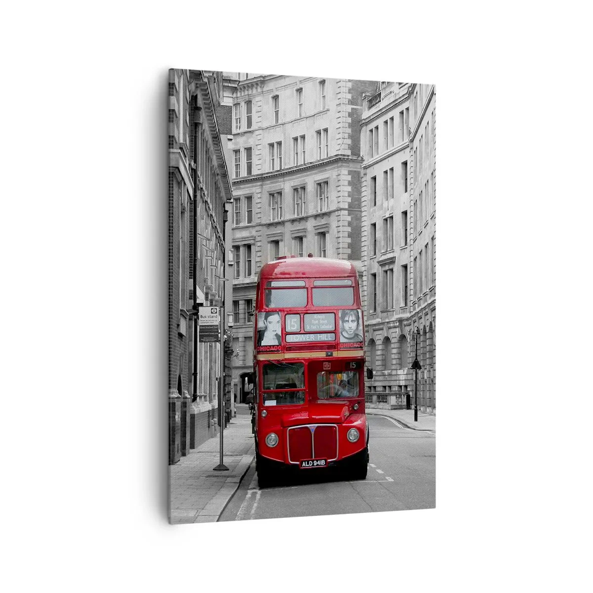 Bild auf Leinwand - Leinwandbild - Ein roter Bus vor einem Hintergrund aus schwarz-weißen Stadtgebäuden. - 80x120cm - Der Alltag muss nicht grau sein - Moderne Wanddekoration für Wohnzimmer und Schlafzimmer ARTTOR