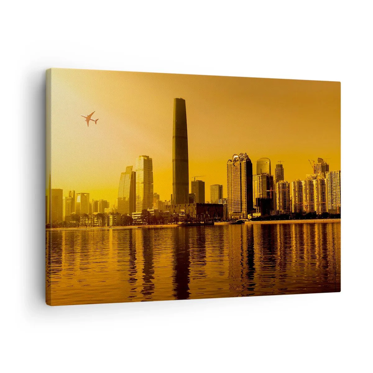 Bild auf Leinwand - Leinwandbild - Stadtpanorama bei Sonnenuntergang mit Wolkenkratzern und einem Flugzeug - 70x50cm - Die goldene Stadt - Moderne Wanddekoration für Wohnzimmer und Schlafzimmer ARTTOR