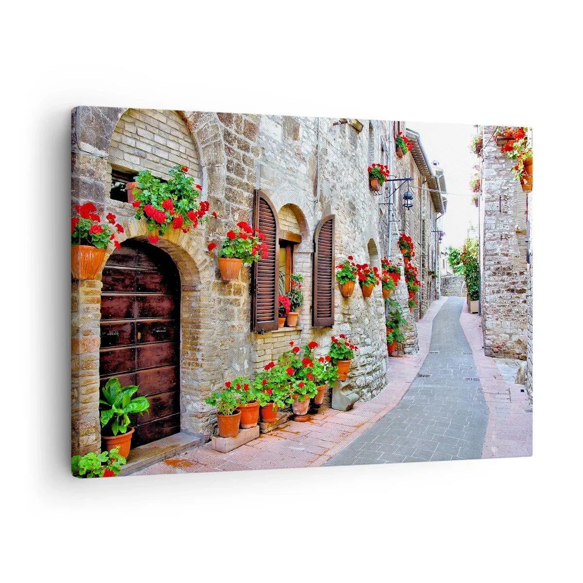 Bild auf Leinwand - Leinwandbild - Eine schmale Straße mit Steingebäuden, die mit Blumentöpfen geschmückt sind - 70x50cm - Italienische Atmosphäre - Moderne Wanddekoration für Wohnzimmer und Schlafzimmer ARTTOR