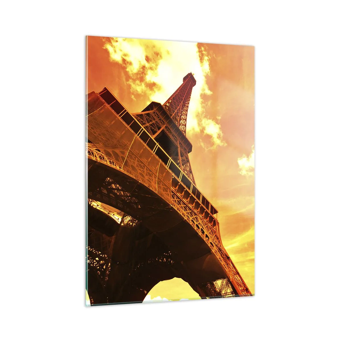 Glasbild - Bild auf glas - Der Eiffelturm in warmen Orangetönen bei Sonnenuntergang - 50x70cm - Monumental, weil es mit der Sonne vergoldet ist - Moderne Wanddekoration für Wohnzimmer und Schlafzimmer ARTTOR