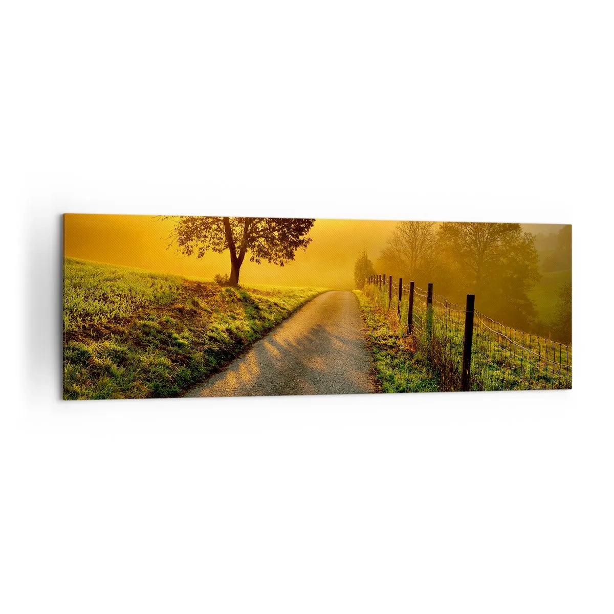 Bild auf Leinwand - Leinwandbild - Eine malerische Straße bei Sonnenuntergang mit einem einsamen Baum im Hintergrund - 160x50cm - Honig-Nachmittag - Moderne Wanddekoration für Wohnzimmer und Schlafzimmer ARTTOR