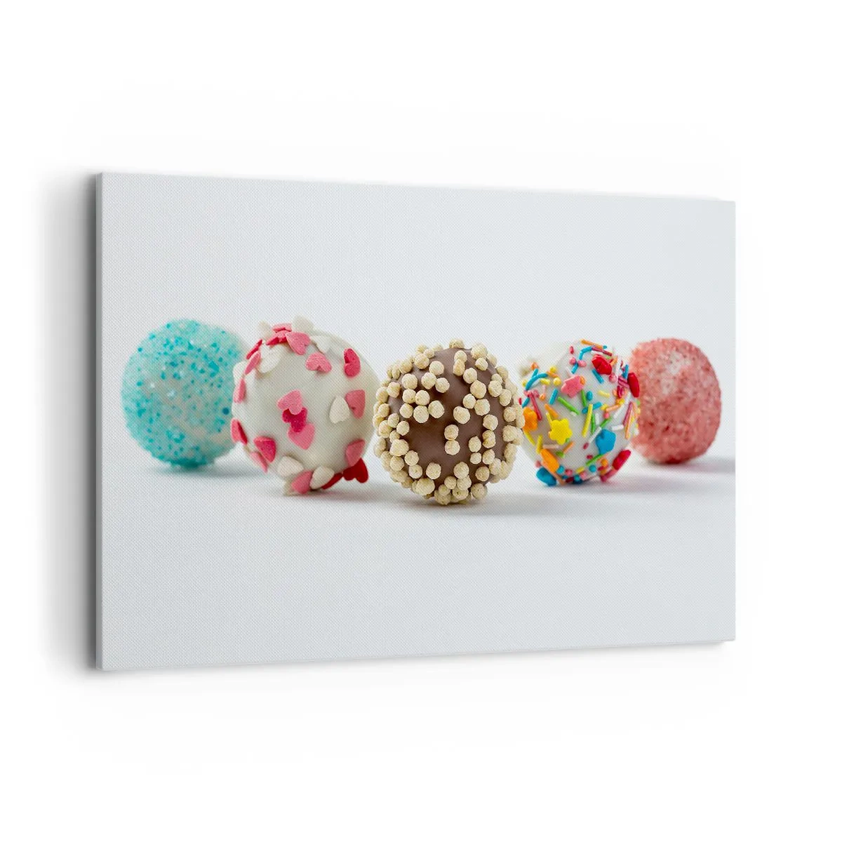 Bild auf Leinwand - Leinwandbild - Bunte Pralinen mit Dekorationen auf weißem Hintergrund - 120x80cm - Das Leben kann süß sein - Moderne Wanddekoration für Wohnzimmer und Schlafzimmer ARTTOR