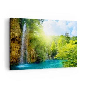 Bild auf Leinwand - Leinwandbild - Ein Wasserfall, der in einen türkisfarbenen See fließt, umgeben von Grün - 120x80cm - Es muss Eden sein - Moderne Wanddekoration für Wohnzimmer und Schlafzimmer ARTTOR