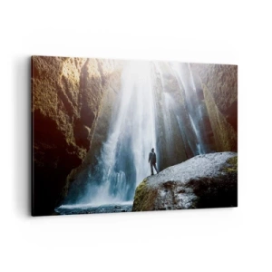Bild auf Leinwand - Leinwandbild - Eine Figur vor der Kulisse eines majestätischen Wasserfalls in einer felsigen Schlucht - 120x80cm - Wiederherstellung der Proportionen - Moderne Wanddekoration für Wohnzimmer und Schlafzimmer ARTTOR