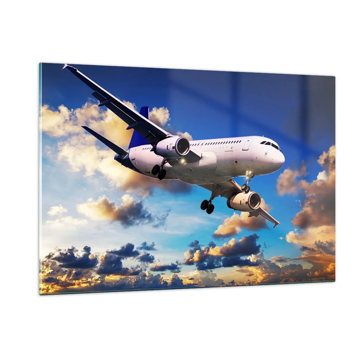 Glasbild - Bild auf glas - Ein Flugzeug im Flug vor einem malerischen Himmel - 120x80cm - Eine Reise in Weiß und Blau - Moderne Wanddekoration für Wohnzimmer und Schlafzimmer ARTTOR