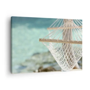 Bild auf Leinwand - Leinwandbild - Eine Hängematte mit Blick auf das türkisfarbene Wasser - 70x50cm - Zeit zum Entspannen - Moderne Wanddekoration für Wohnzimmer und Schlafzimmer ARTTOR