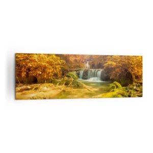 Bild auf Leinwand - Leinwandbild - Ein goldener Wasserfall in einem herbstlichen Wald, umgeben von Grün - 160x50cm - Waldkaskade in Gold - Moderne Wanddekoration für Wohnzimmer und Schlafzimmer ARTTOR