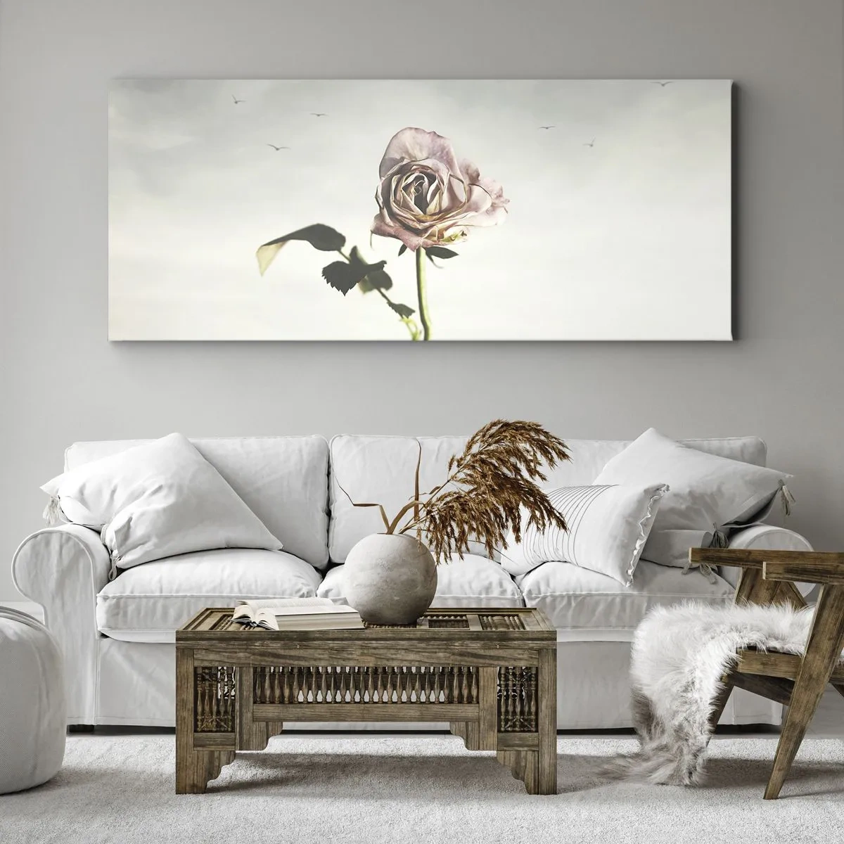 Bild auf Leinwand - Leinwandbild - Eine zarte Rose vor einem hellen Himmel mit fliegenden Vögeln - 140x50cm - Begrüßung des Frühlings - Moderne Wanddekoration für Wohnzimmer und Schlafzimmer ARTTOR
