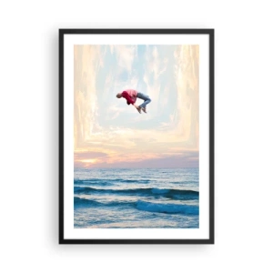 Poster in einem schwarzem Rahmen - Ein Mann springt bei Sonnenuntergang in den Himmel über dem Meer - 50x70cm - In eine andere Dimension - Moderne Wanddekoration für Wohnzimmer und Schlafzimmer ARTTOR