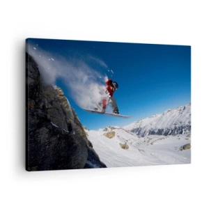 Bild auf Leinwand - Leinwandbild - Ein Snowboarder springt von einem Felsen vor einer Berglandschaft - 70x50cm - Und du wurdest Teil des Raums - Moderne Wanddekoration für Wohnzimmer und Schlafzimmer ARTTOR