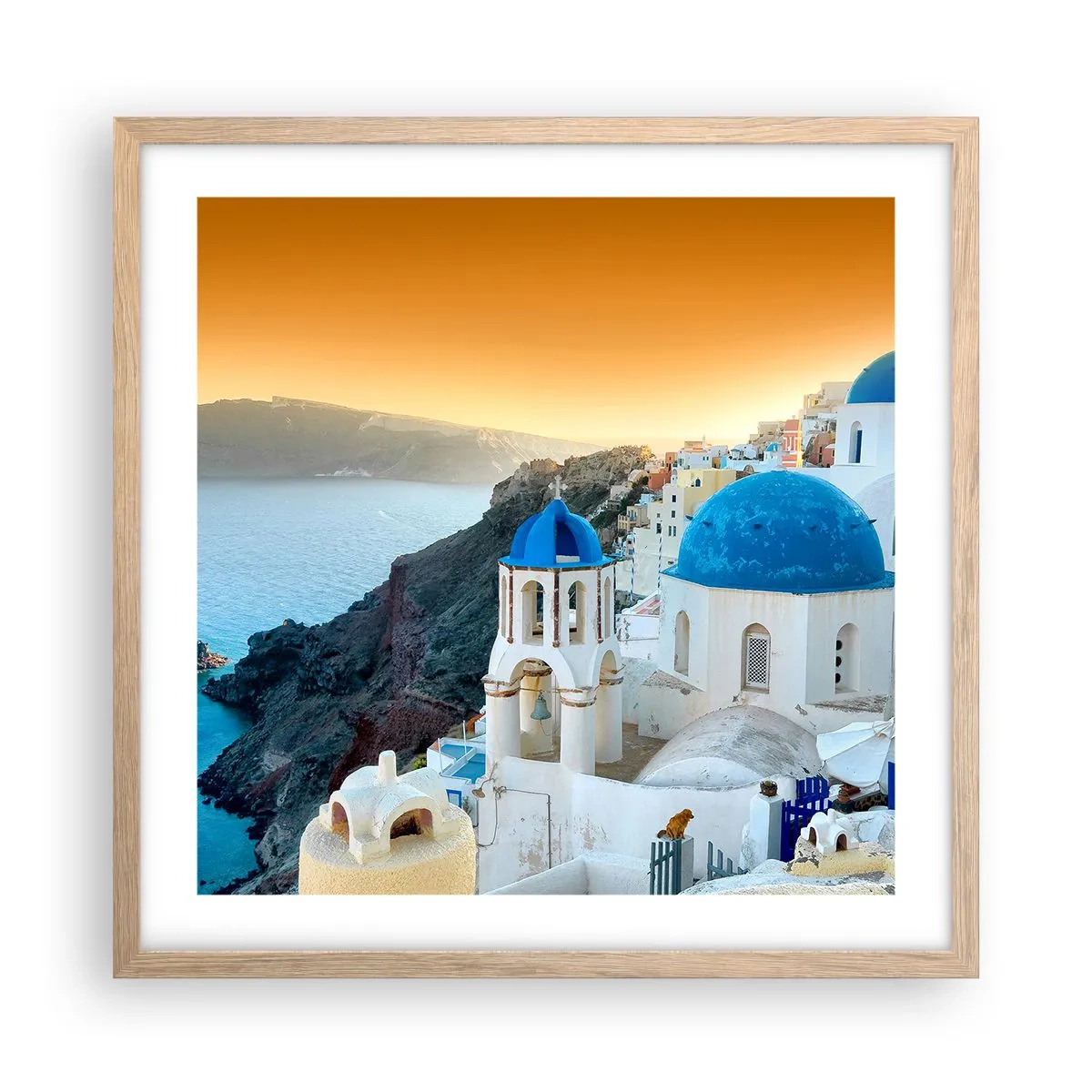 Poster in einem Rahmen aus heller Eiche - Santorini - an die Felsen gekuschelt - 50x50 cm