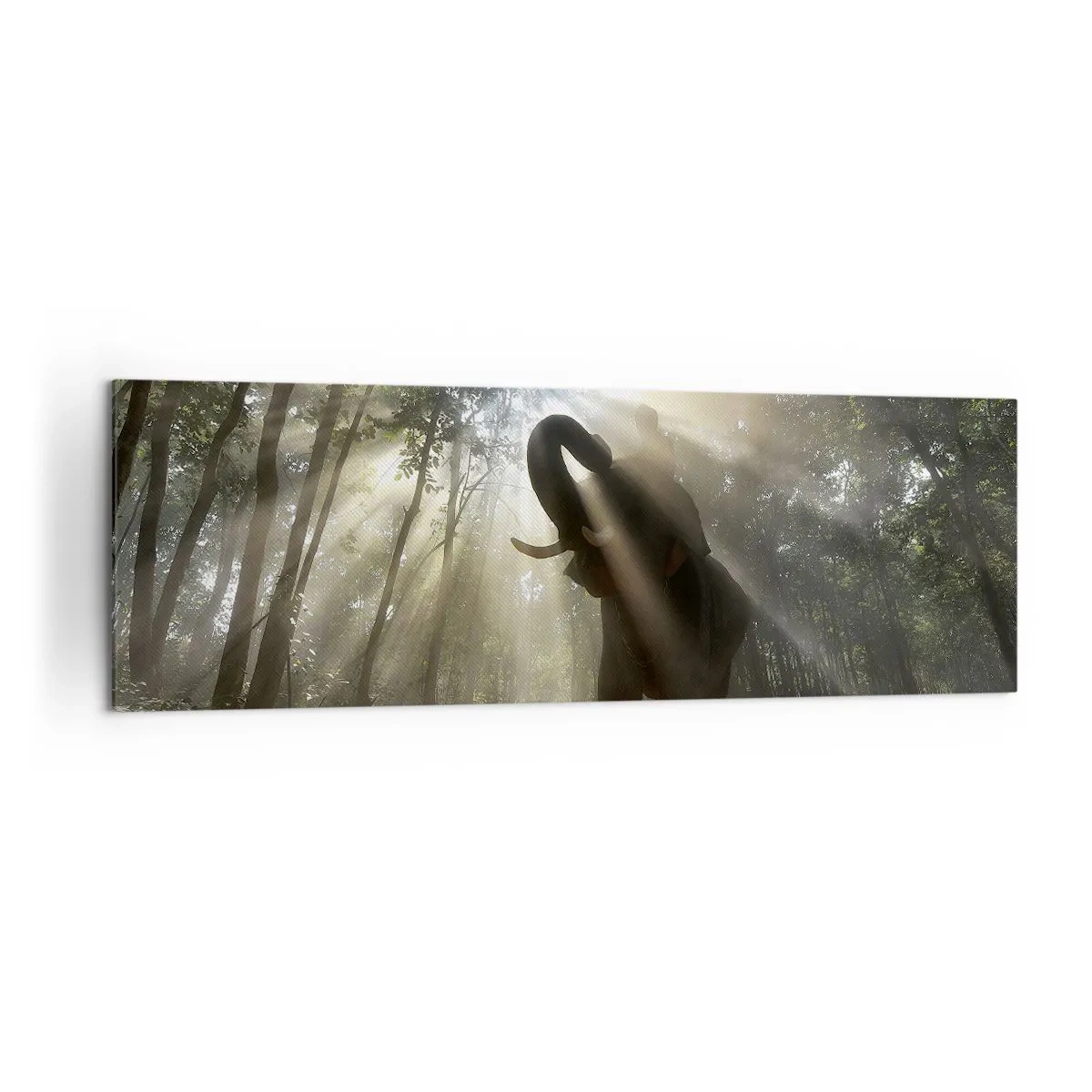 Bild auf Leinwand - Leinwandbild - Ein Elefant im Wald, umgeben von Lichtstrahlen im Morgennebel - 160x50cm - Unter dem Glücksstern - Moderne Wanddekoration für Wohnzimmer und Schlafzimmer ARTTOR