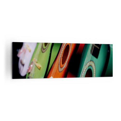 Bild auf Leinwand - Leinwandbild - Bunte Gitarren in verschiedenen Farbtönen in einer Reihe angeordnet - 160x50cm - Die Gitarre hat viele Farben - Moderne Wanddekoration für Wohnzimmer und Schlafzimmer ARTTOR