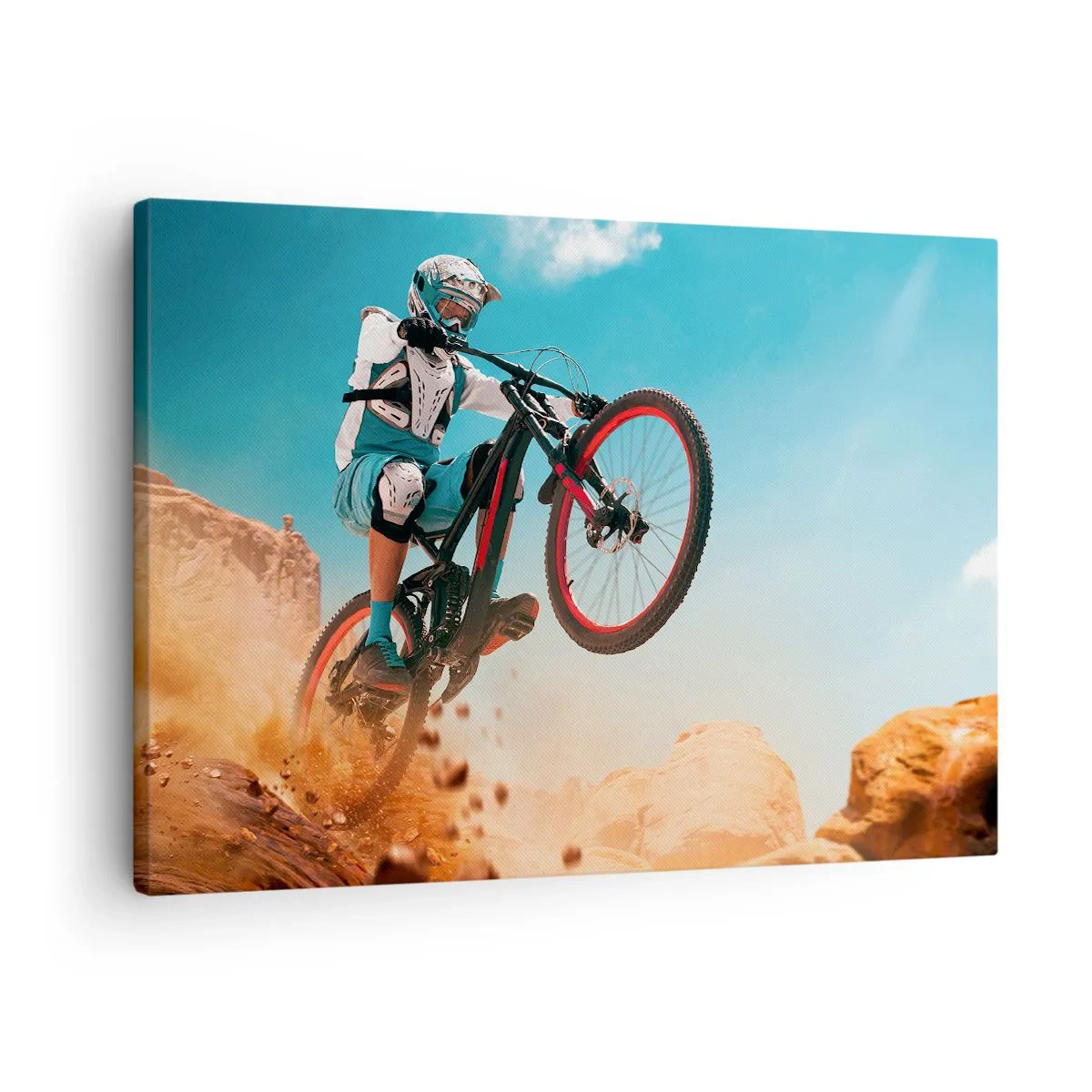 Bild auf Leinwand - Leinwandbild - Ein Mountainbiker macht einen Sprung vor einer Felskulisse - 70x50cm - Fahrrad-Wahnsinn-Dämon - Moderne Wanddekoration für Wohnzimmer und Schlafzimmer ARTTOR