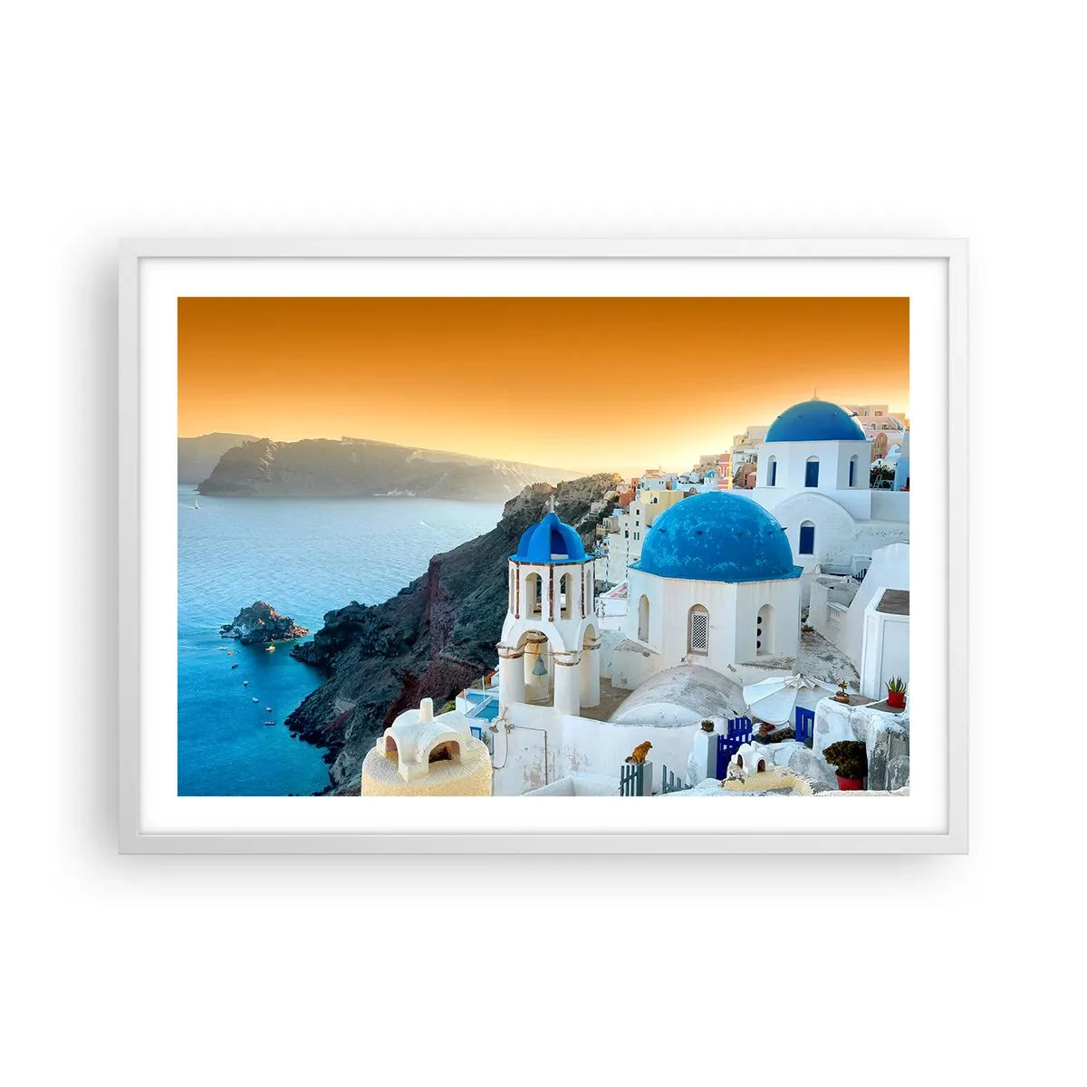Poster in einem weißen Rahmen - Santorini - an die Felsen gekuschelt - 70x50 cm
