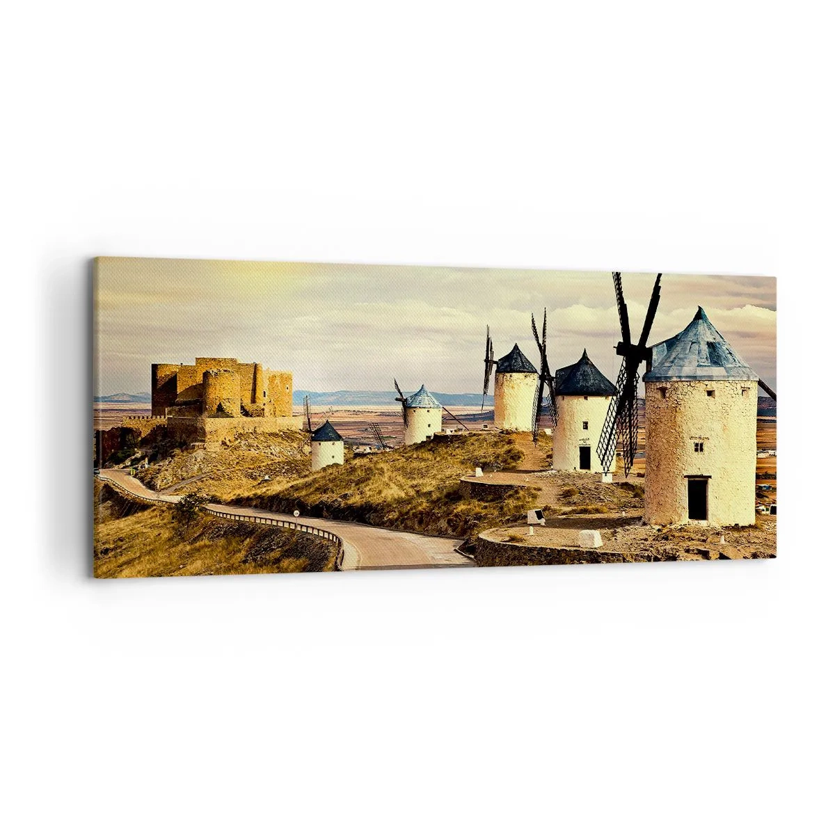 Bild auf Leinwand - Leinwandbild - Windmühlen auf den Hügeln mit einer historischen Burg im Hintergrund - 120x50cm - Don Quijote kommt gleich - Moderne Wanddekoration für Wohnzimmer und Schlafzimmer ARTTOR