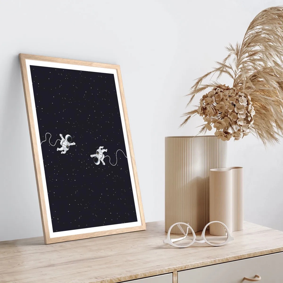 Poster in einem Rahmen aus heller Eiche - Kosmischer Tanz - 40x50 cm