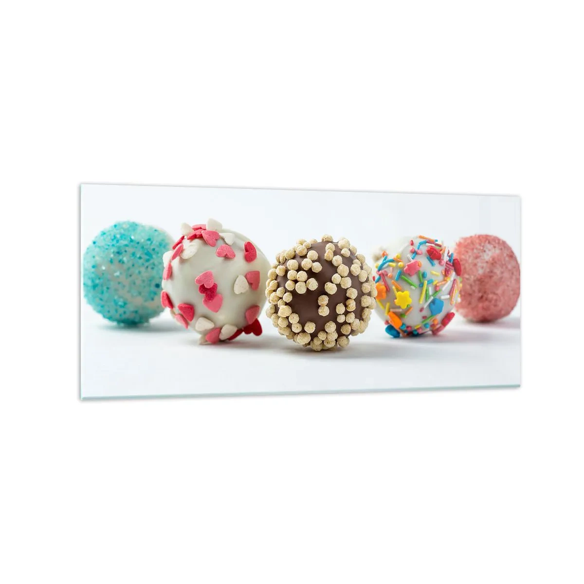 Glasbild - Bild auf glas - Bunte Pralinen mit Dekorationen auf weißem Hintergrund - 120x50cm - Das Leben kann süß sein - Moderne Wanddekoration für Wohnzimmer und Schlafzimmer ARTTOR