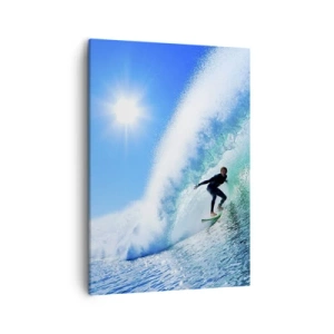 Bild auf Leinwand - Leinwandbild - Ein Surfer auf einem Brett reitet unter blauem Himmel auf einer starken Welle. - 50x70cm - Durch das große Blau - Moderne Wanddekoration für Wohnzimmer und Schlafzimmer ARTTOR