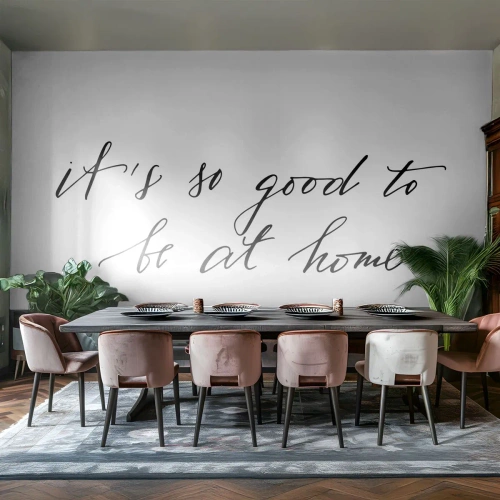 Fototapete Premium Sand - „Es ist so schön, zu Hause zu sein“ Zitat in Kalligraphie - 100x70cm - Die ganze Wahrheit - Moderne Wanddekoration für Wohnzimmer und Schlafzimmer ARTTOR