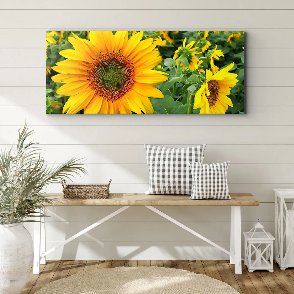 Bild auf Leinwand - Leinwandbild - Ein Feld mit Sonnenblumen und gelben Blüten vor einem Hintergrund aus grünen Blättern - 140x50cm - Hunderte von Sonnen flammten auf - Moderne Wanddekoration für Wohnzimmer und Schlafzimmer ARTTOR