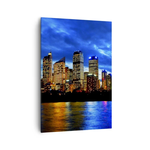 Bild auf Leinwand - Leinwandbild - Panorama der nächtlichen Stadt mit beleuchteten Wolkenkratzern über dem Wasser - 70x100cm - Eine Nacht der Lichter und Farben - Moderne Wanddekoration für Wohnzimmer und Schlafzimmer ARTTOR