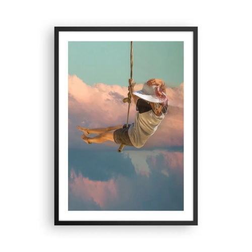 Poster in einem schwarzem Rahmen - Eine Frau auf einer Schaukel zwischen pastellfarbenen Wolken - 50x70cm - Spaß in den Wolken - Moderne Wanddekoration für Wohnzimmer und Schlafzimmer ARTTOR