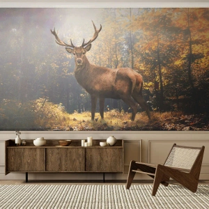 Fototapete Premium Sand - Ein stattlicher Hirsch in einem herbstlichen Wald, der vom Sonnenlicht beleuchtet wird - 100x70cm - In voller Majestät - Moderne Wanddekoration für Wohnzimmer und Schlafzimmer ARTTOR