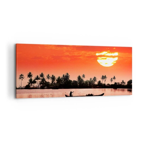 Bild auf Leinwand - Leinwandbild - Tropischer Sonnenuntergang mit einem Boot und Palmen im Hintergrund - 120x50cm - Die Ruhe der Tropen bei Sonnenuntergang - Moderne Wanddekoration für Wohnzimmer und Schlafzimmer ARTTOR