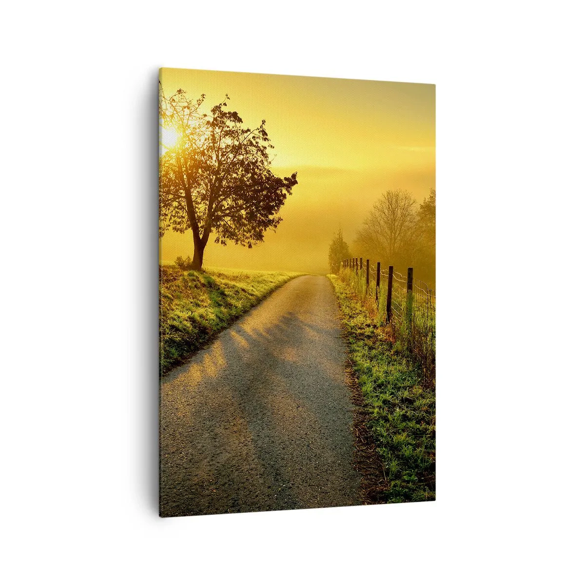 Bild auf Leinwand - Leinwandbild - Eine malerische Straße bei Sonnenuntergang mit einem einsamen Baum im Hintergrund - 70x100cm - Honig-Nachmittag - Moderne Wanddekoration für Wohnzimmer und Schlafzimmer ARTTOR