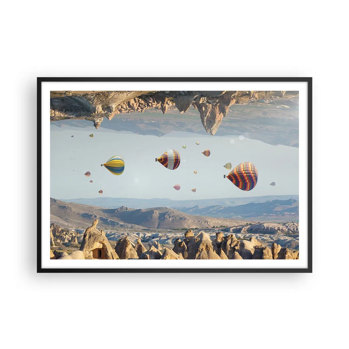 Poster in einem schwarzem Rahmen - Bunte Ballons über einer felsigen Landschaft - 100x70cm - Hier ist alles möglich - Moderne Wanddekoration für Wohnzimmer und Schlafzimmer ARTTOR