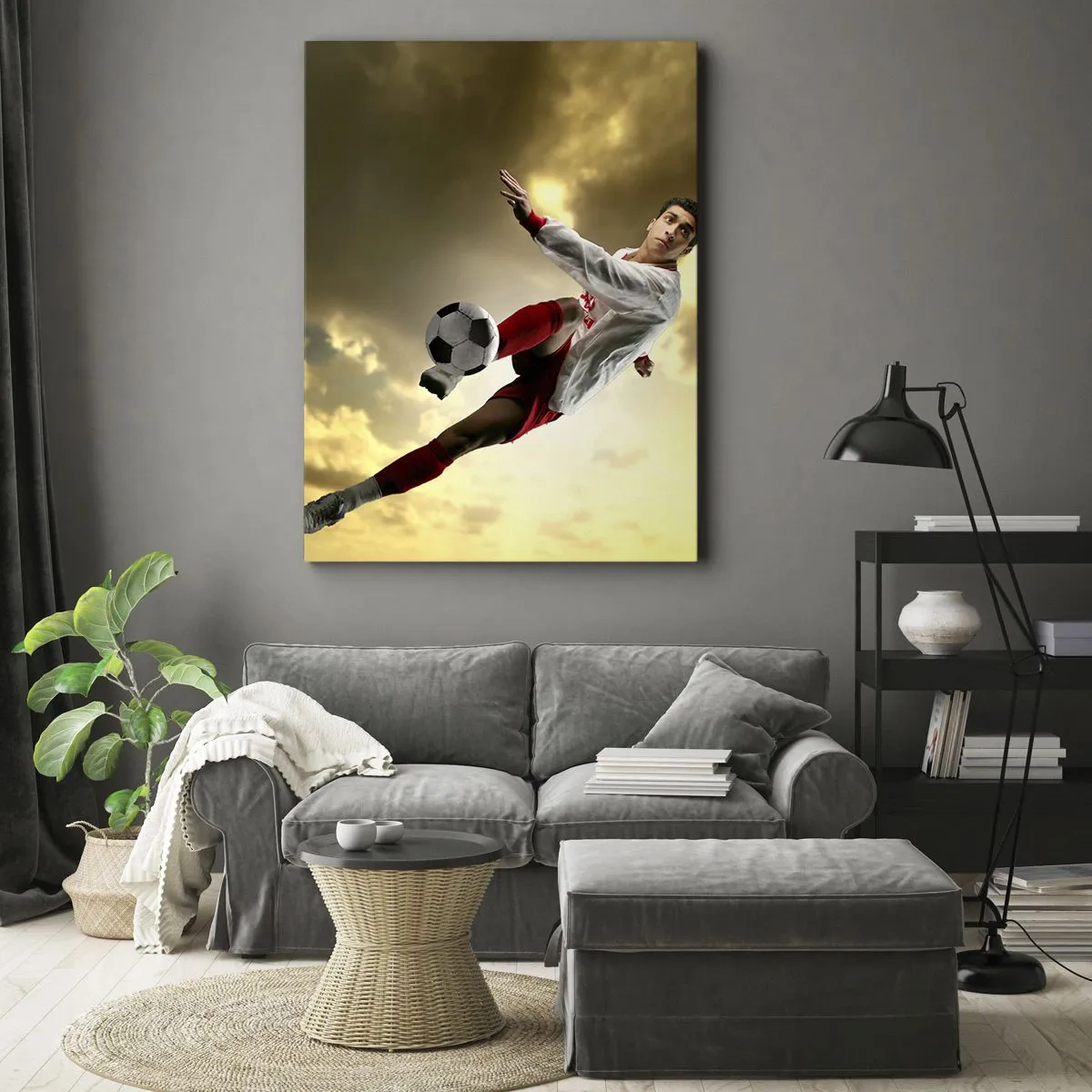Bild auf Leinwand - Leinwandbild - Ein Fußballspieler in einem dynamischen Sprung kickt den Ball in den Himmel - 70x100cm - Fußballhimmel - Moderne Wanddekoration für Wohnzimmer und Schlafzimmer ARTTOR