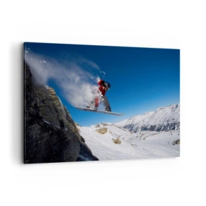 Bild auf Leinwand - Leinwandbild - Ein Snowboarder springt von einem Felsen vor einer Berglandschaft - 100x70cm - Und du wurdest Teil des Raums - Moderne Wanddekoration für Wohnzimmer und Schlafzimmer ARTTOR